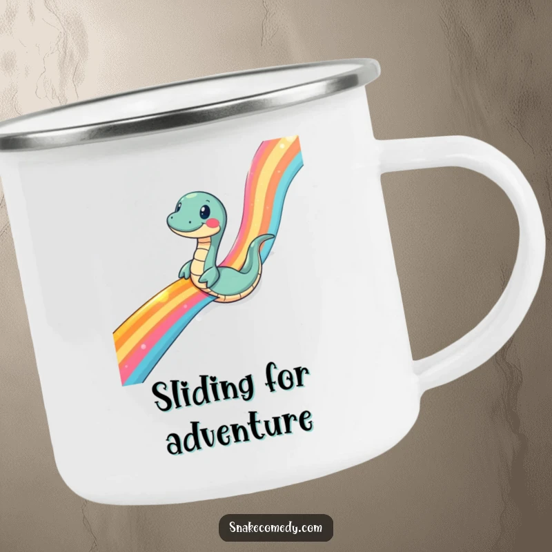 Funny snake camping mug, durable, featuring a snake comically sliding down a rainbow ribbon, for campers who love vibrant fun.