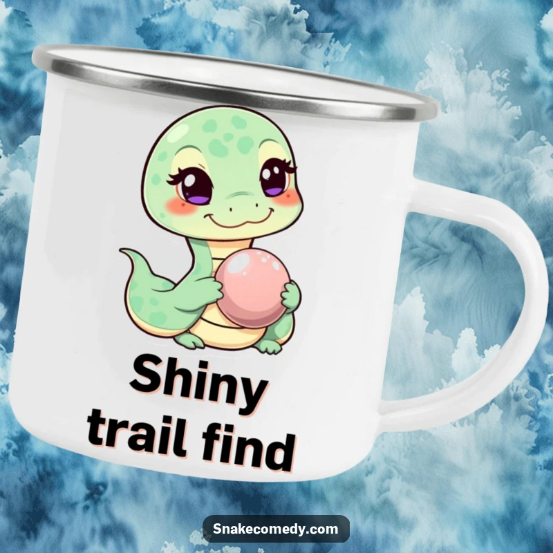 Funny camping mug with a mischievous winking snake character offering a shiny pebble, perfect for outdoor adventures.