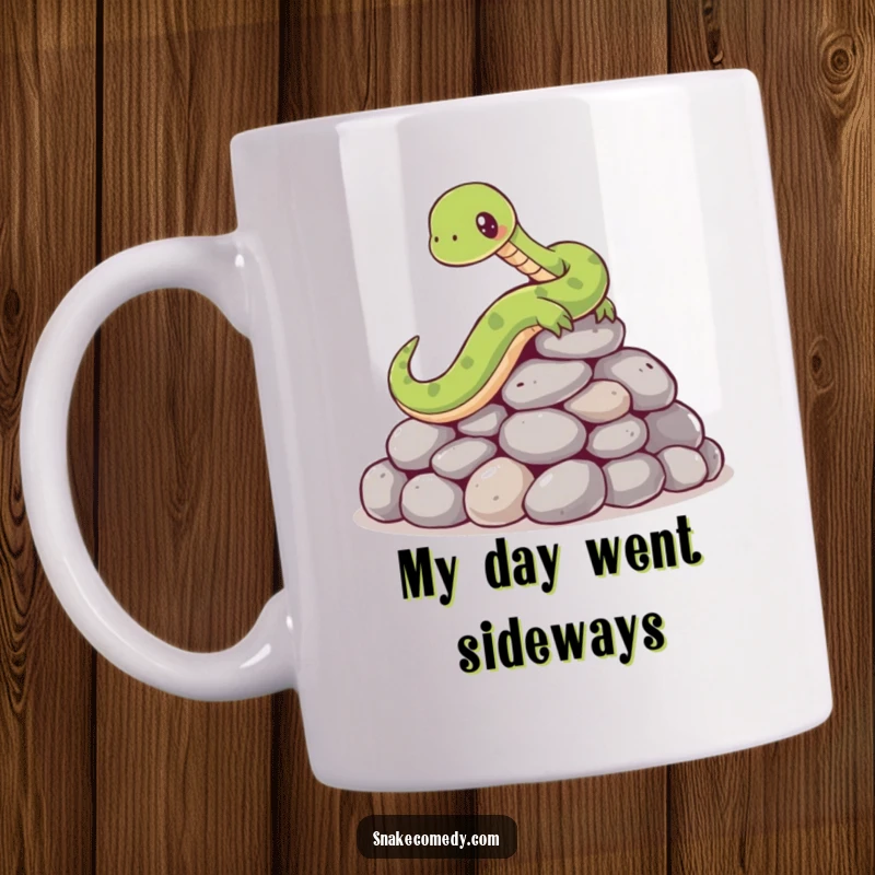 Funny mug featuring a cartoon snake comically slipping and sliding on a pile of smooth, round stones, expressing surprise and a bit of embarrassment.