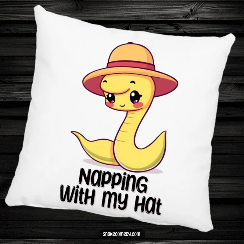Funny snake character happily balancing a small round hat on a plush pillow, bringing cozy charm and dapper vibes.