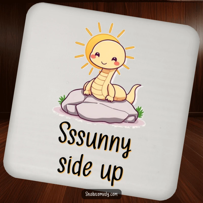 Funny snake coaster featuring a contented snake sunning on a rock, a humorous and protective addition to tabletops.