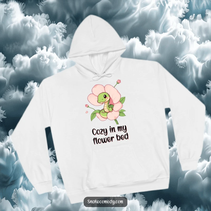 Funny hoodie depicting a cute snake playfully peeking from the center of a beautiful, blooming flower, conveying a sense of delightful surprise.