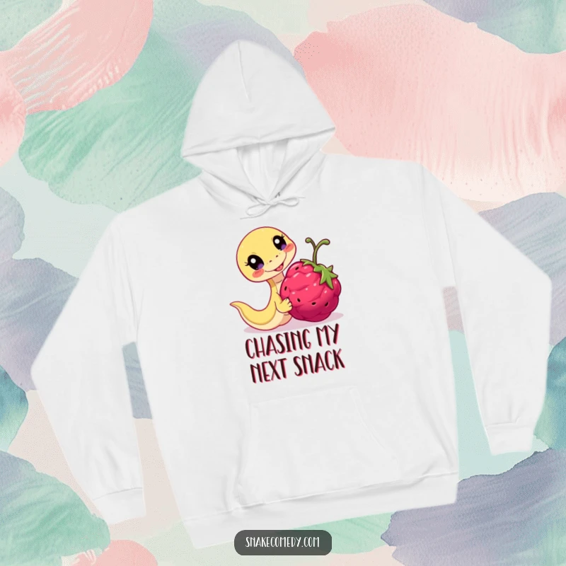 Funny Playful Snake Hoodie: serpent chasing a berry with enthusiasm, perfect for cozy fun and gifts.