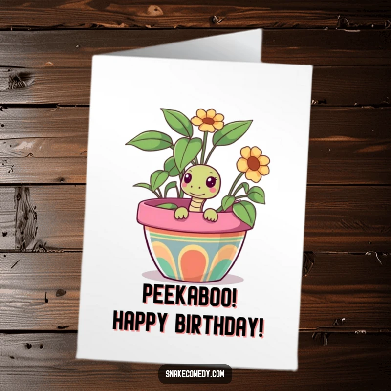 Funny Free Printable Birthday Card featuring a curious snake peeking out from a large, vibrant flower pot.