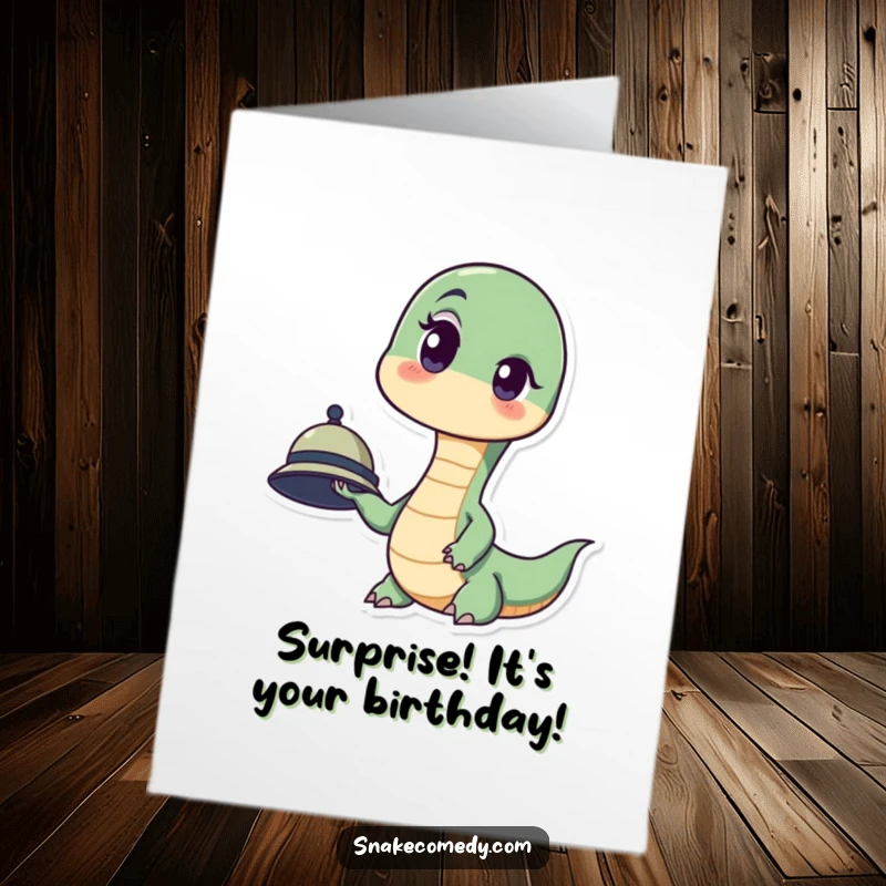 Funny Free Printable Birthday Card: A snake looks surprised with a raised eyebrow, holding a tiny hat, wishing Happy Birthday.