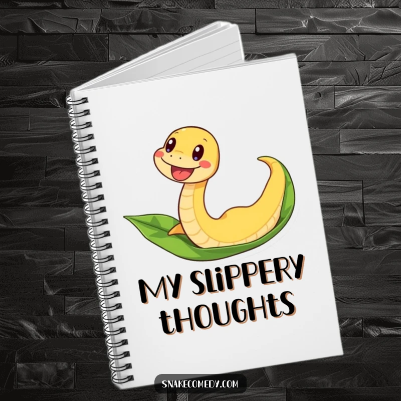 Funny snake notebook with an excited snake sliding down a leaf, ideal for jotting down adventurous thoughts.