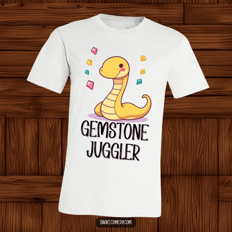 Funny t-shirt featuring a grinning, wiggling snake character skillfully juggling three small, sparkling gems, radiating playful energy.