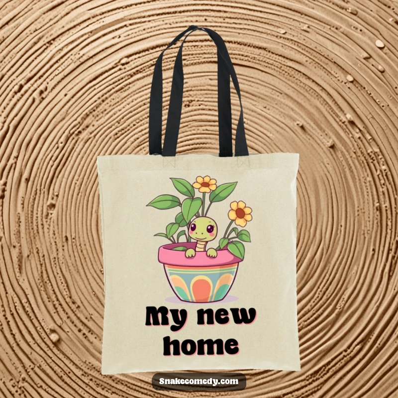 Funny snake tote bag with a curious snake peeking out from a colorful flower pot, ideal for carrying items with charm.